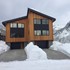 thumbnail image of condos with snow but driveways are clear